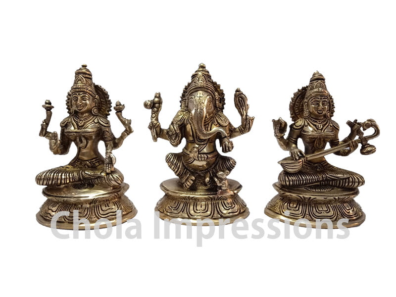 Lakshmi Ganesh Saraswati Brass Idol Set - 7 inches Lakshmi Ganesh Saraswati Brass Idol Set - 7 inches