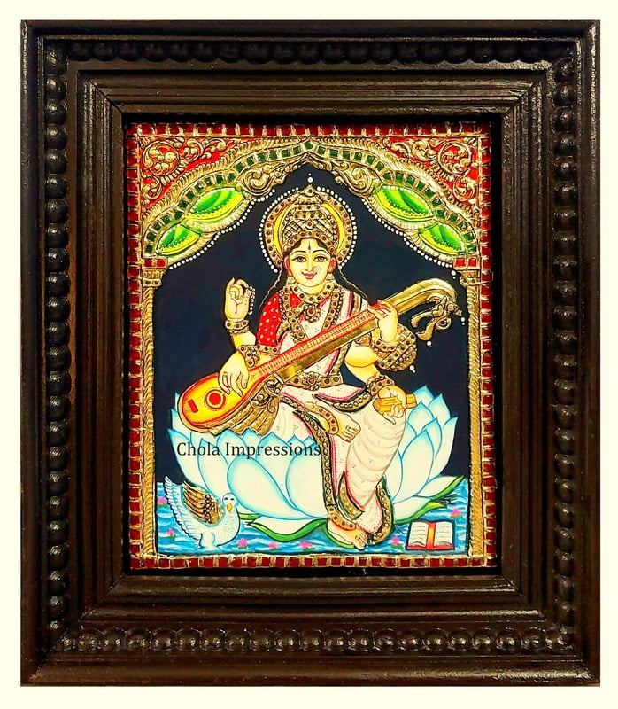 Saraswati Devi Tanjore Painting on White Lotus Saraswati Devi Tanjore Painting on White Lotus